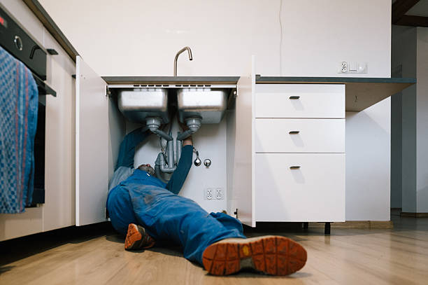 Professional Plumbing technician working in Clinton, IL